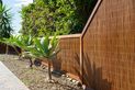 Natureed privacy fence for a residence by House of Bamboo.