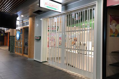 ATDC installs security shutter at Krispy Kreme storefront