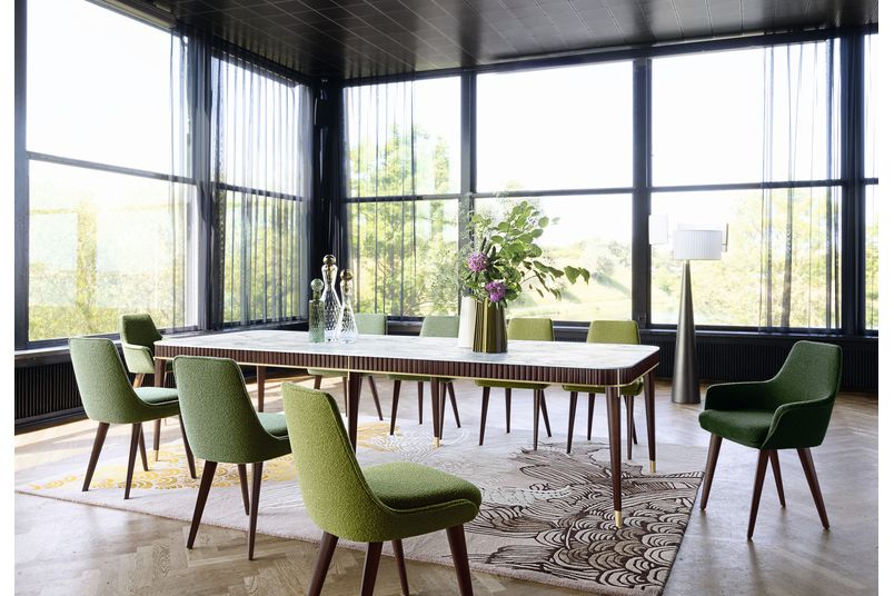Sacha Lakic designed the Eden Rock dining table collection for Roche Bobois.