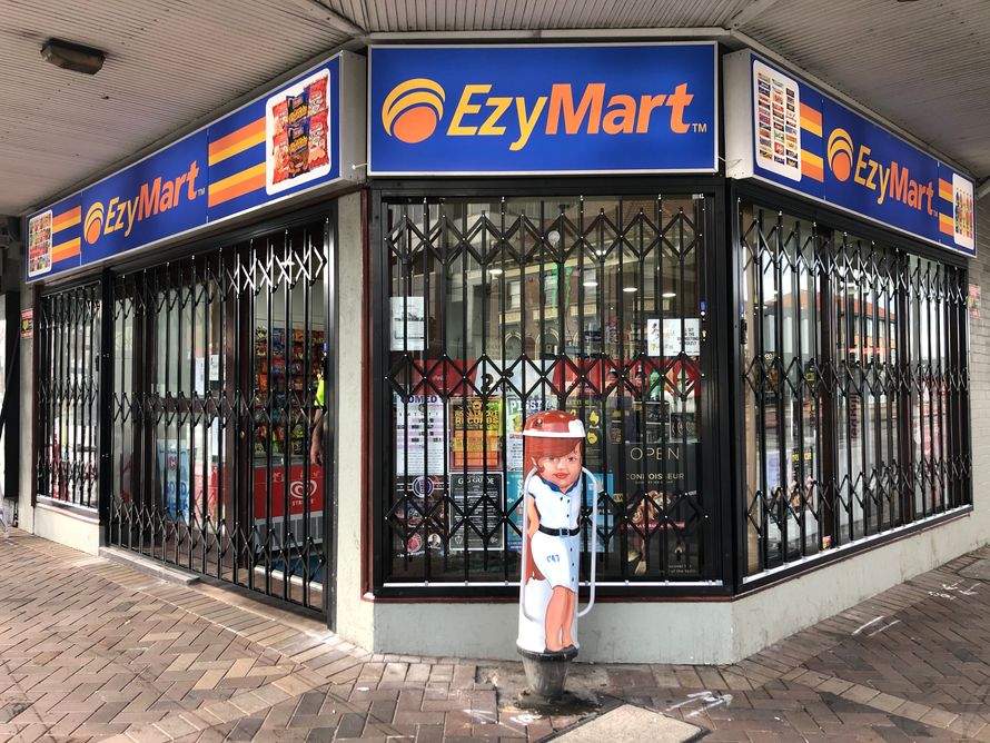 Shop front security doors for an Ezy Mart store