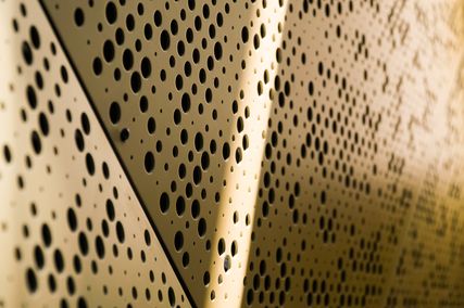 Perforated metal finishes