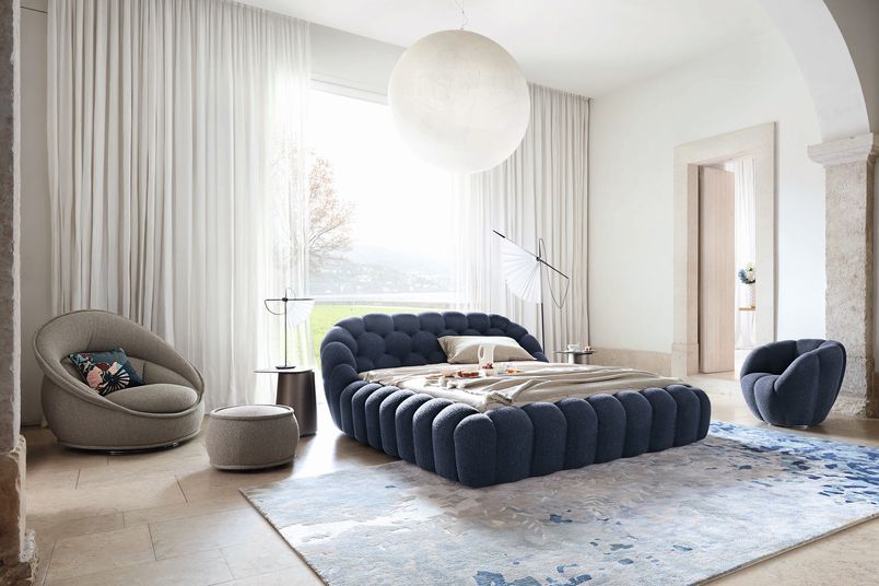 Designed by Sacha Lakic, the Bubble bed is upholstered in Orsetto Flex fabric.